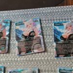 SithLord’s own photo of Arahbo cards in different foil finishes.